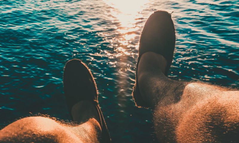 Mann Beine Meer Wasser Sonne