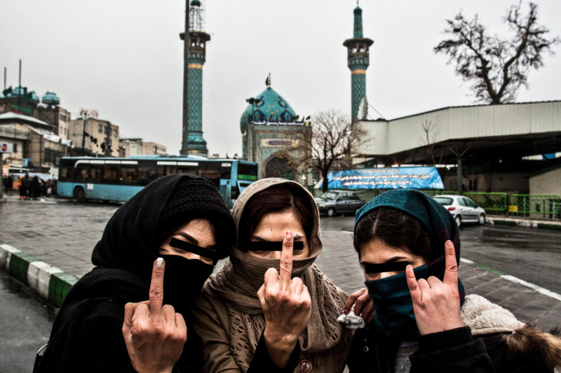 Portrait of three young girls on a day of anniversary of death of prophet Mohammed