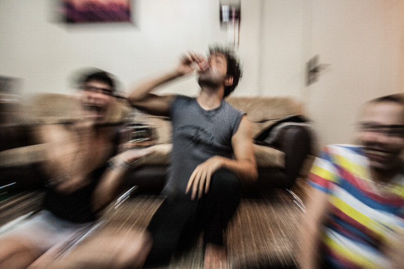 Gay couple and their gay friends are having fun in their houses every night. Drinking strong alcohol (ethanol)l from the pharmacy shop. Ethanol is inside of a bottle for cleaning.